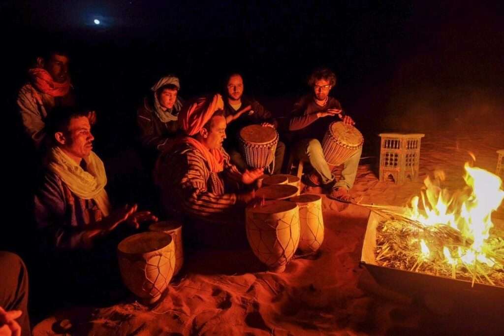 Morocco best sahara tours, Morocco desert tour, under stars in desert with a berber music atmosphere